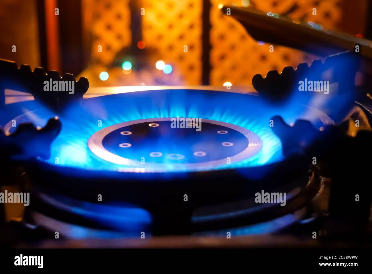Burning gas stove. Blue flame of a gas burner Stock Photo Alamy