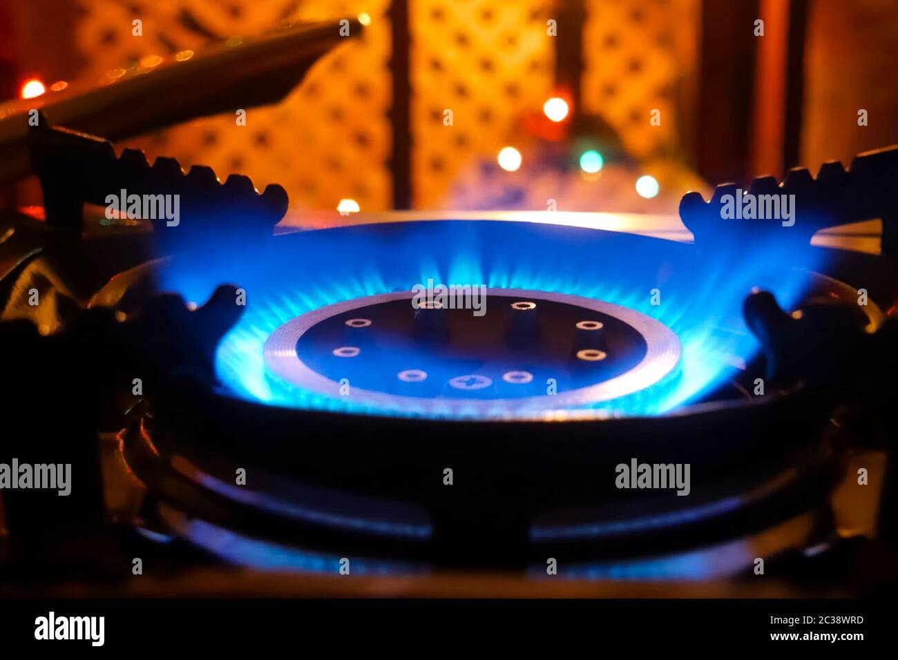 Burning gas stove. Blue flame of a gas burner Stock Photo Alamy
