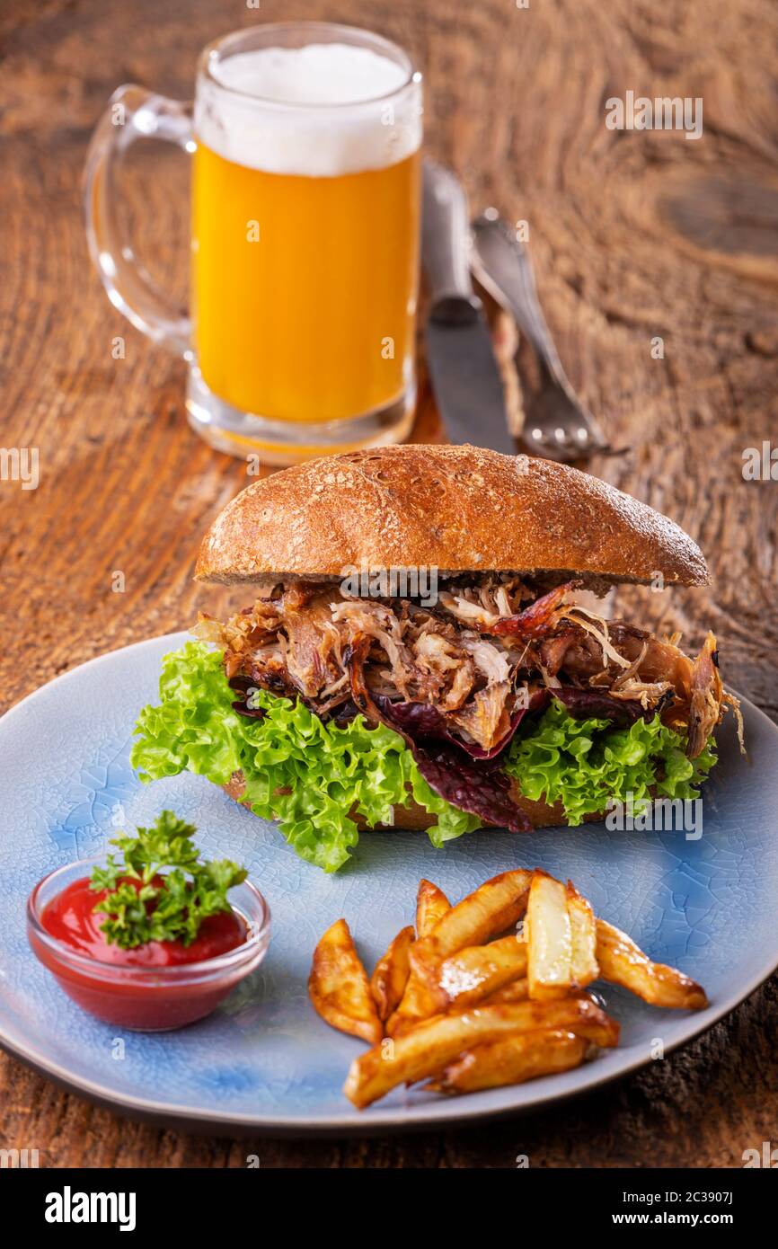 pulled pork in a bun with beer Stock Photo
