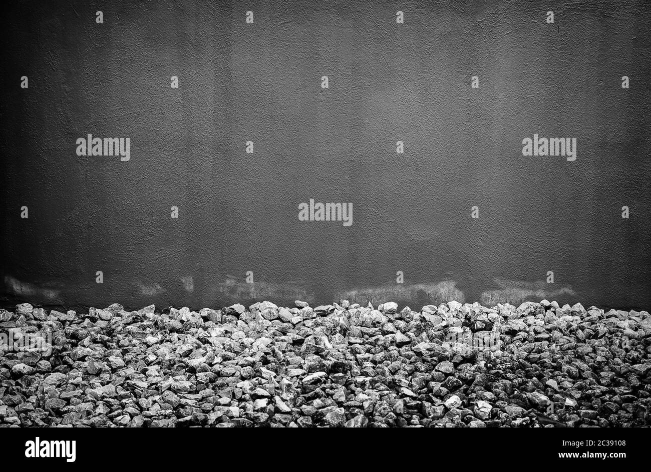 Red wall with stones, textured background detail Stock Photo Alamy