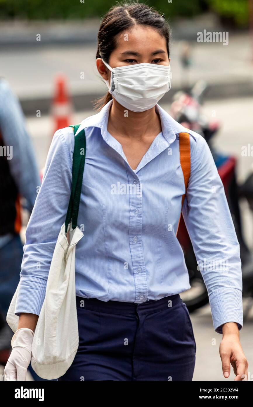 Girl wearing face mask during Covid 19 pandemic, Bangkok, Thailand