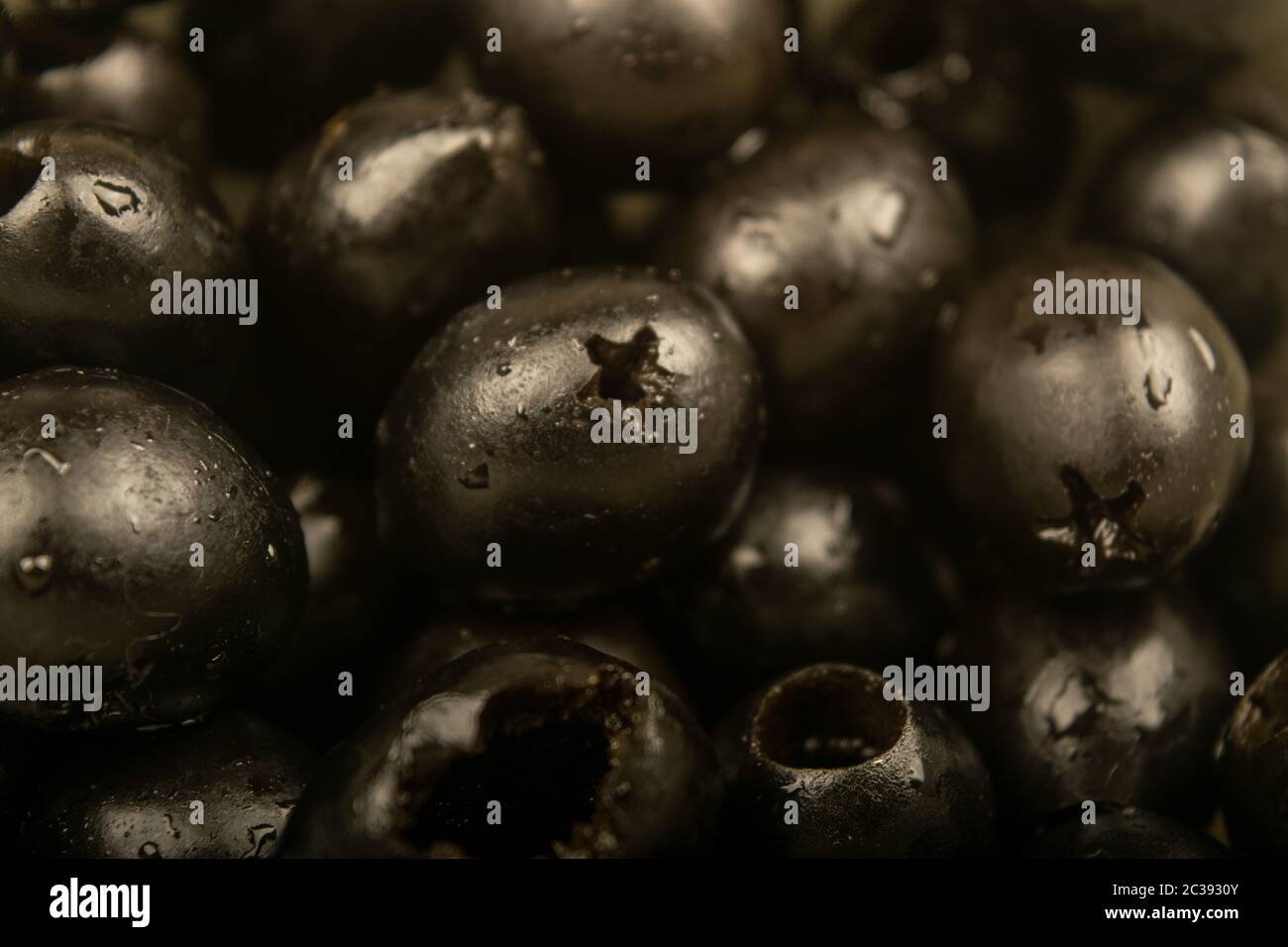 Black olives without seeds. Close up. Surface texture Stock Photo