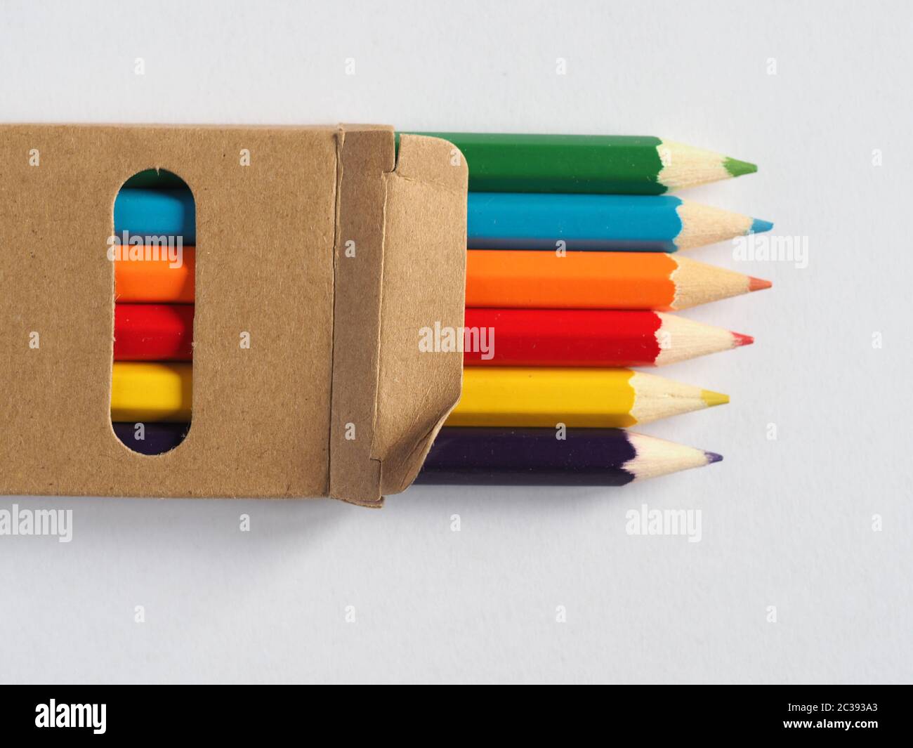 colour pencil crayons in a cardboard box Stock Photo Alamy