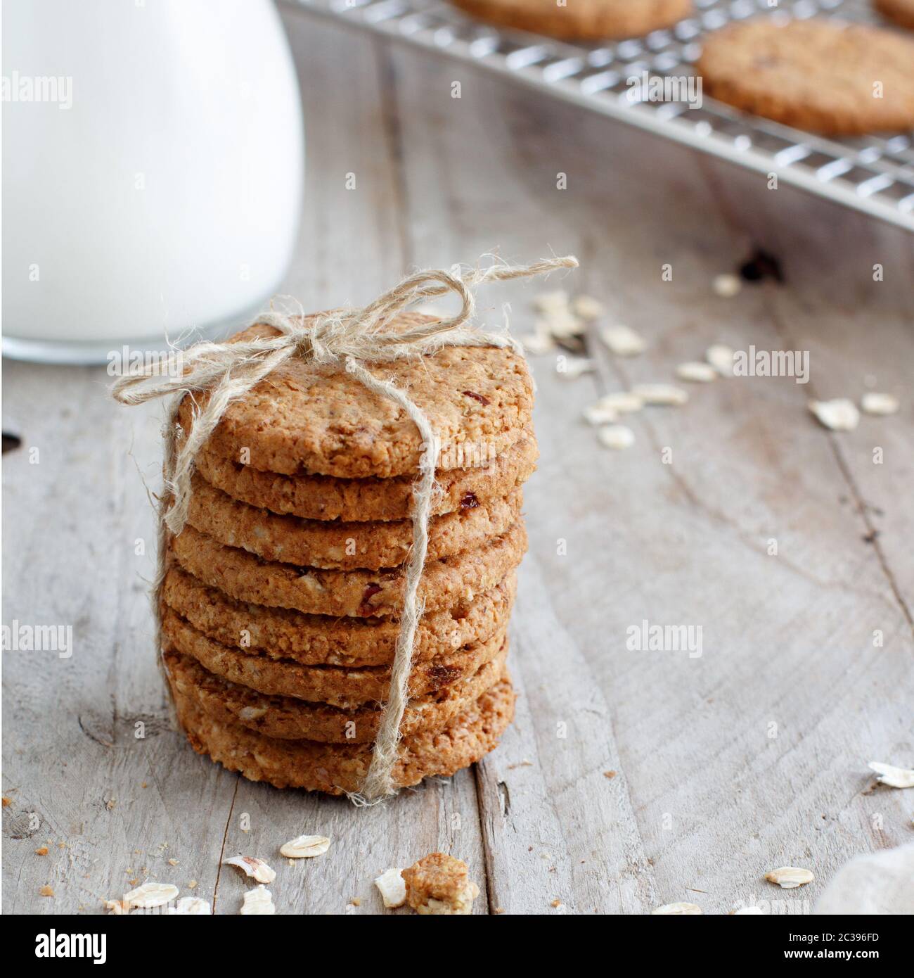 Homemade oatmeal cookies with milk close up Stock Photo Alamy