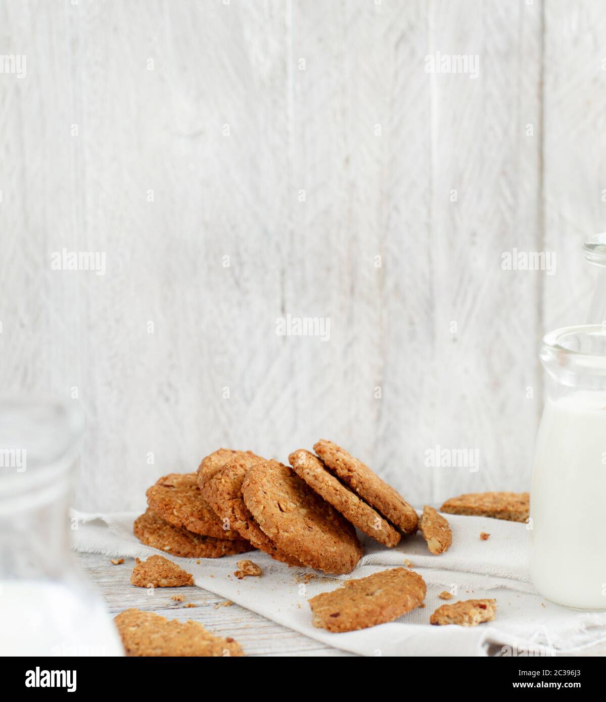 Homemade oatmeal cookies with milk close up Stock Photo Alamy