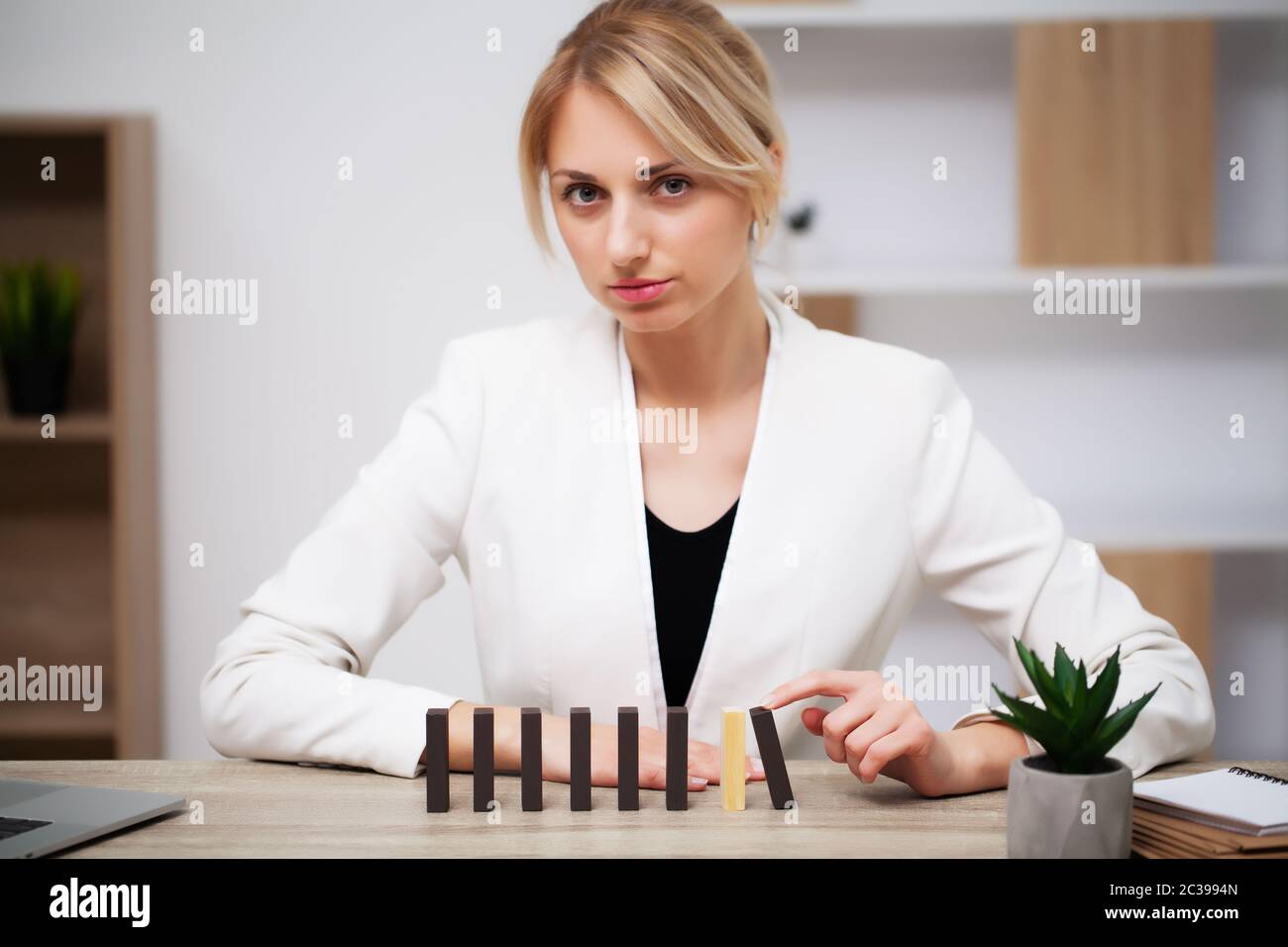 Business growth concept, beautiful young woman businesswoman builds company development plans Stock Photo