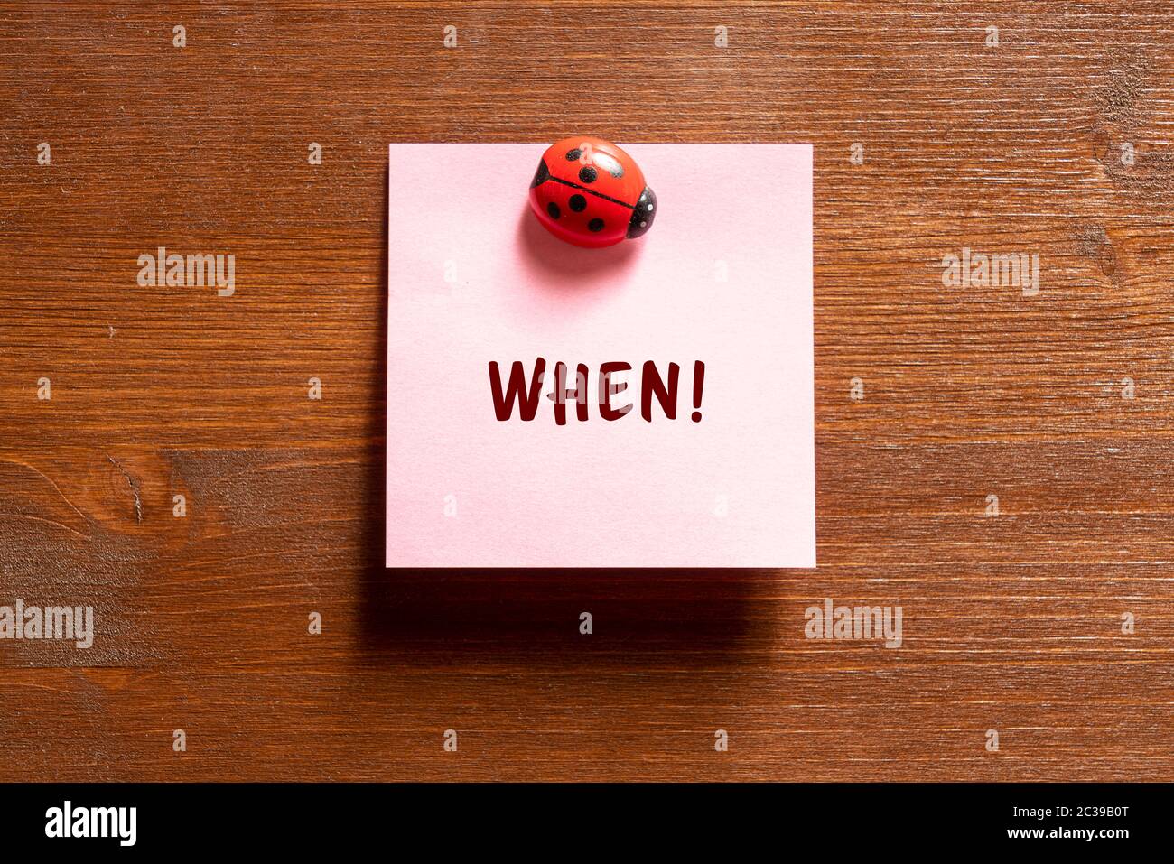 a colored memo sheet with writing  when Stock Photo