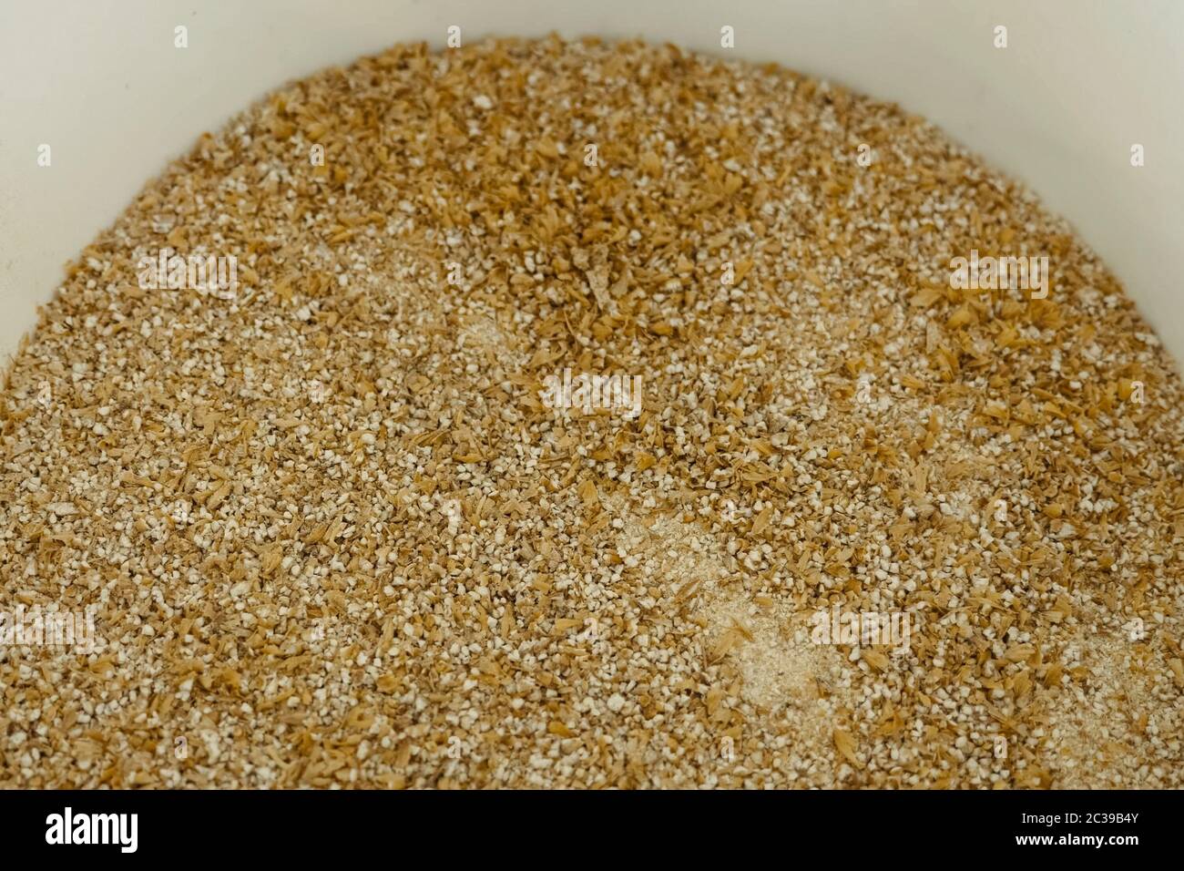 Ground barley in a container, grinding barley Stock Photo Alamy