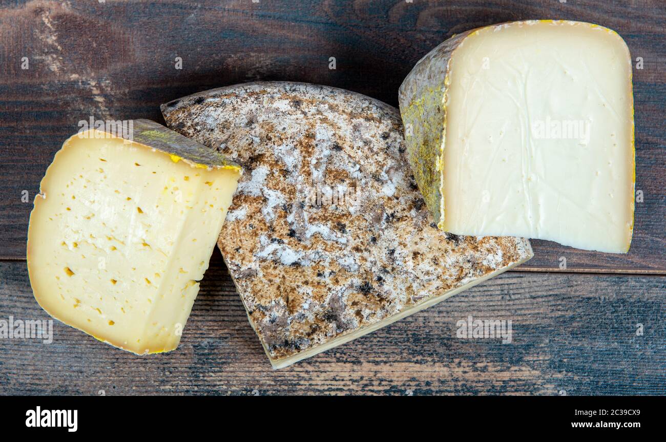 cheeses and Tomme de Savoie, the  French cheese Savoy, french Alps France. Stock Photo