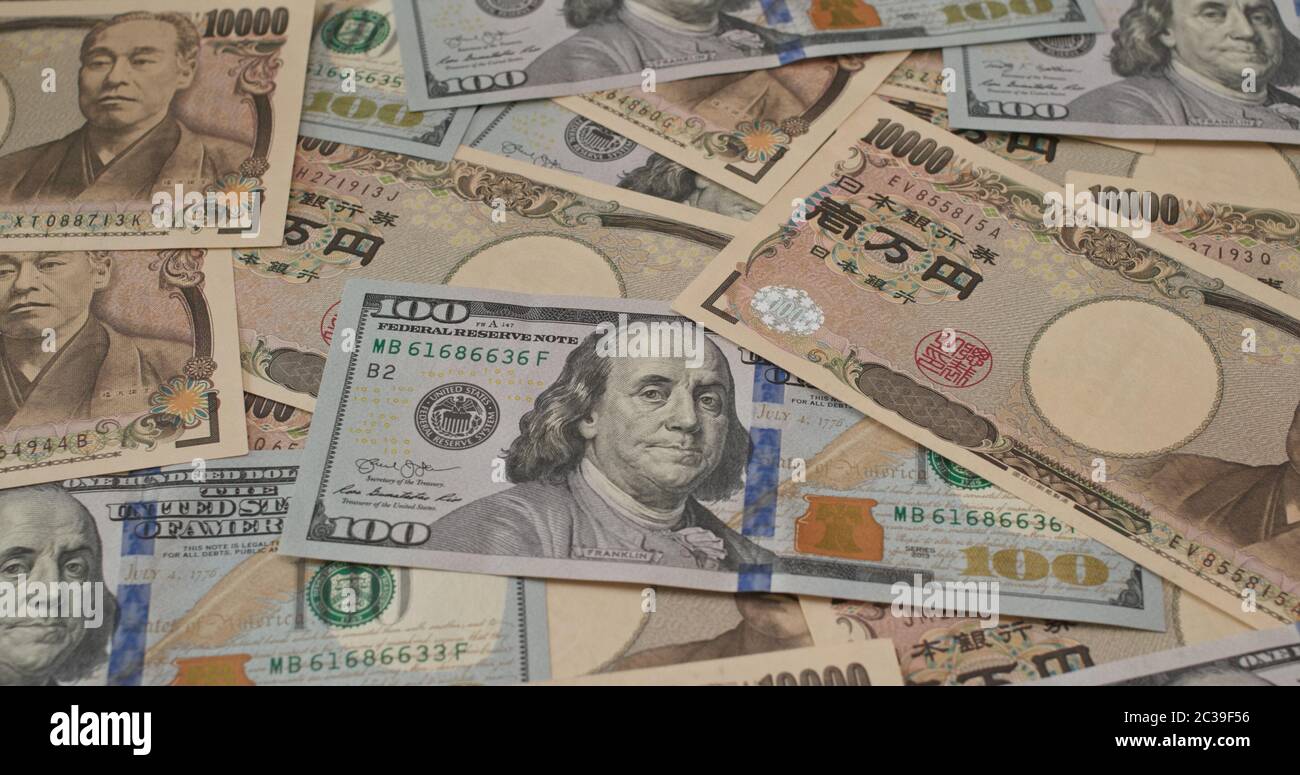 USD banknote and Japanese yen Stock Photo - Alamy