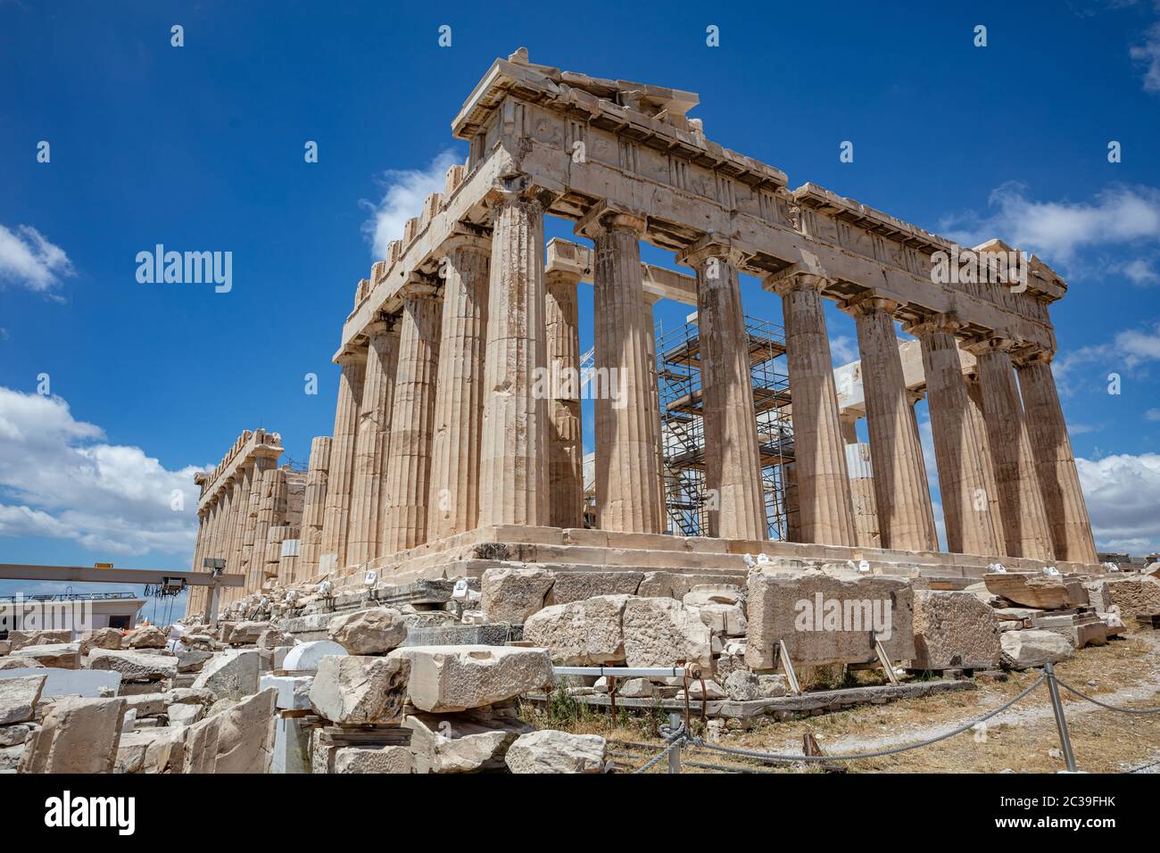 Athens Acropolis, Greece. Parthenon temple facade side view, ancient temple ruins, blue sky background in spring sunny day. Stock Photo