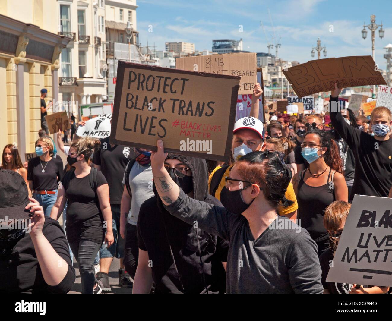 Protesters at a BLM rally march through Brighton Stock Photo