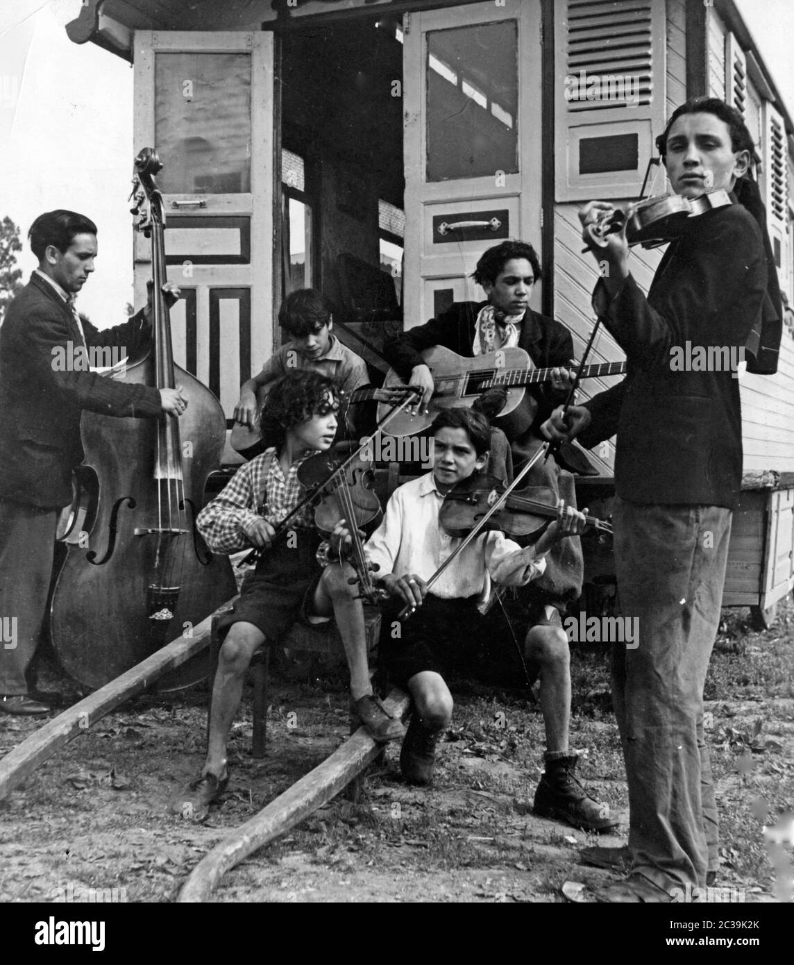 A group of children and young adults belonging to the Sinti and Roma ...