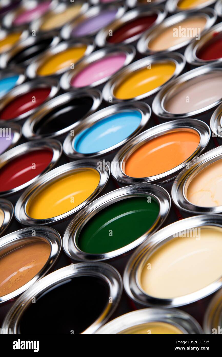 reativity concept group of tin metal cans with color paint Stock Photo ...