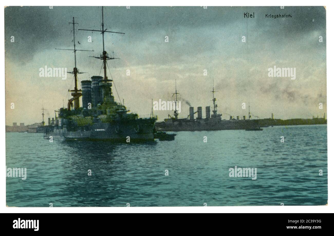 German historical postcard: Warships in the port of Kiel. Colorized photo, world war one 1914-1918. German empire Stock Photo