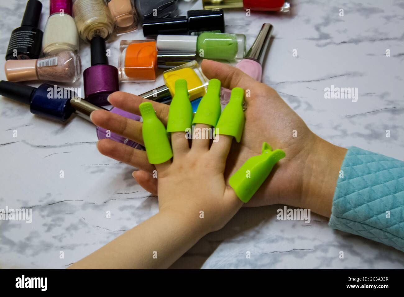 Children's manicure. Children's beauty salon. Paint your child's nails