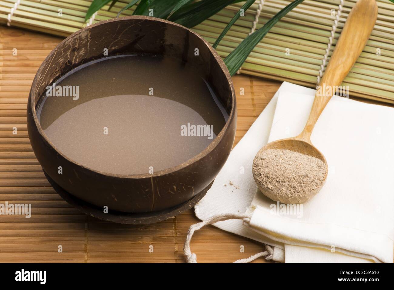 Kava drink made from the roots of the kava plant mixed with water Stock Photo