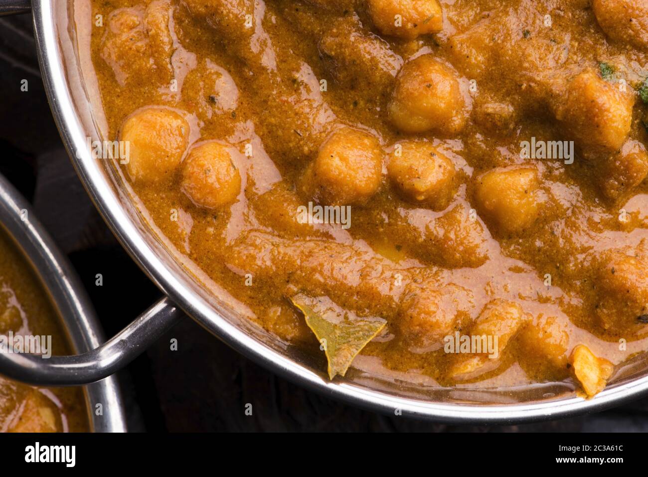 Chana Masala Traditional Indian dish with chickpeas and curry Stock