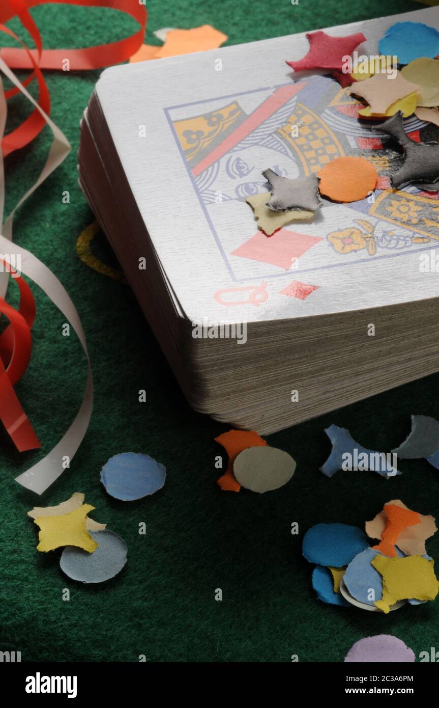 Deck of poker cards with confetti Stock Photo