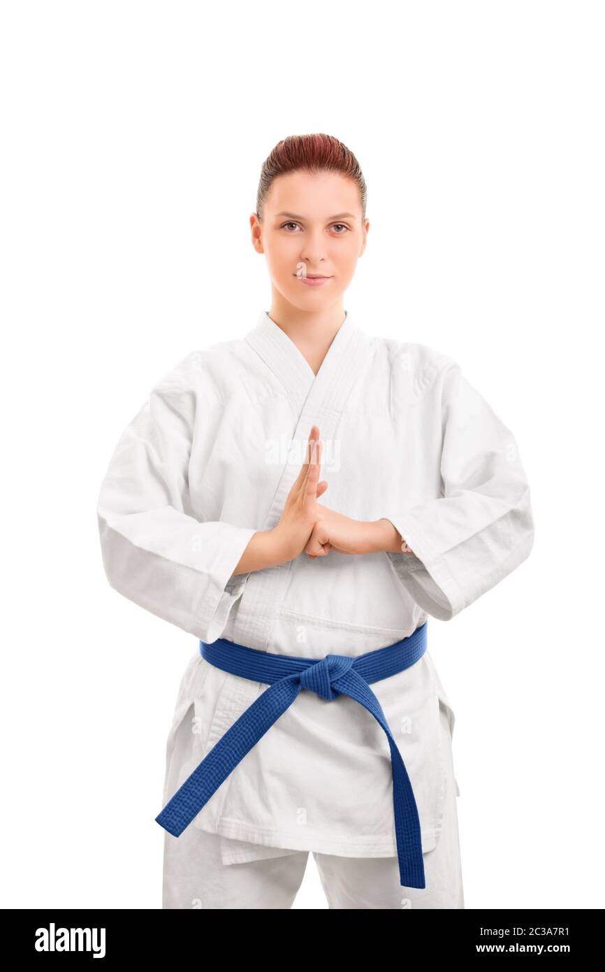 Portrait of a beautiful female martial arts fighter in a white kimono