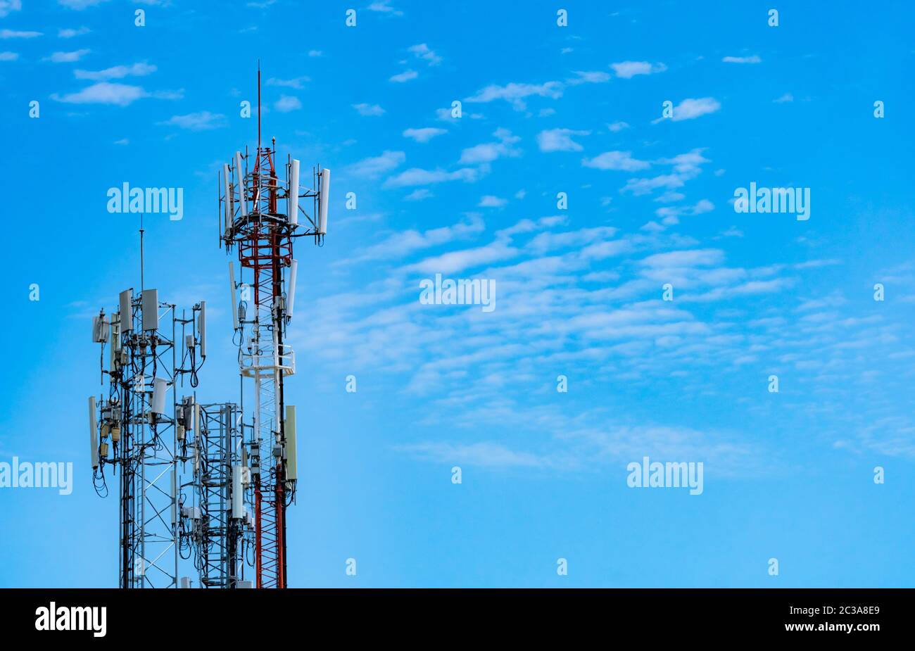 Telecommunication tower with blue sky and white clouds background. Antenna  on blue sky. Radio and satellite pole. Communication technology. Telecommun  Stock Photo - Alamy