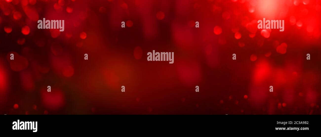 Abstract red luminous hearts with romantic bokeh effects. Background ...