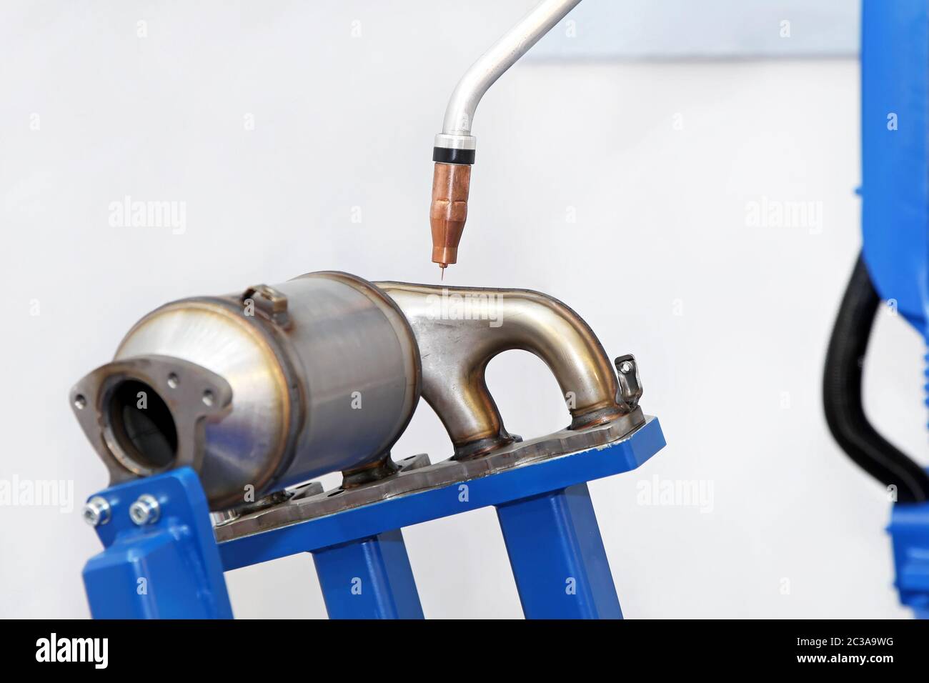 Catalytic converter and exhaust parts welding process Stock Photo - Alamy