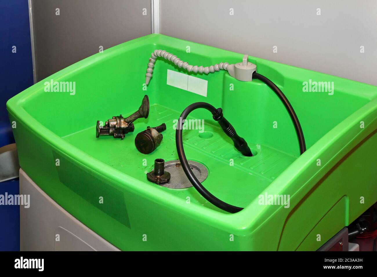 Ecological parts washer with circulation chemicals in garage Stock Photo Alamy
