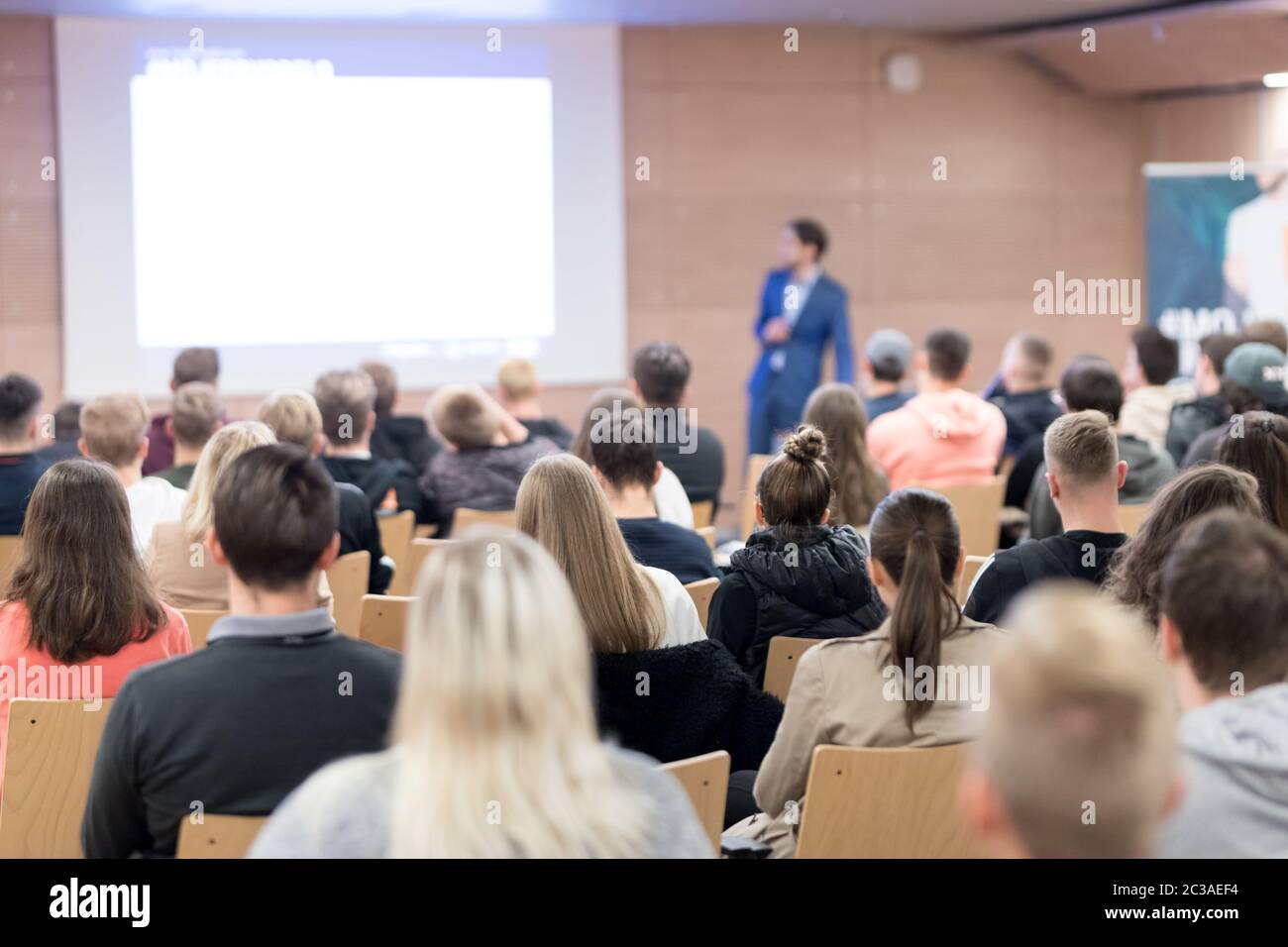 Speaker giving a talk in conference hall at business event. Audience at the conference hall. Business and Entrepreneurship concept. Focus on unrecogni Stock Photo