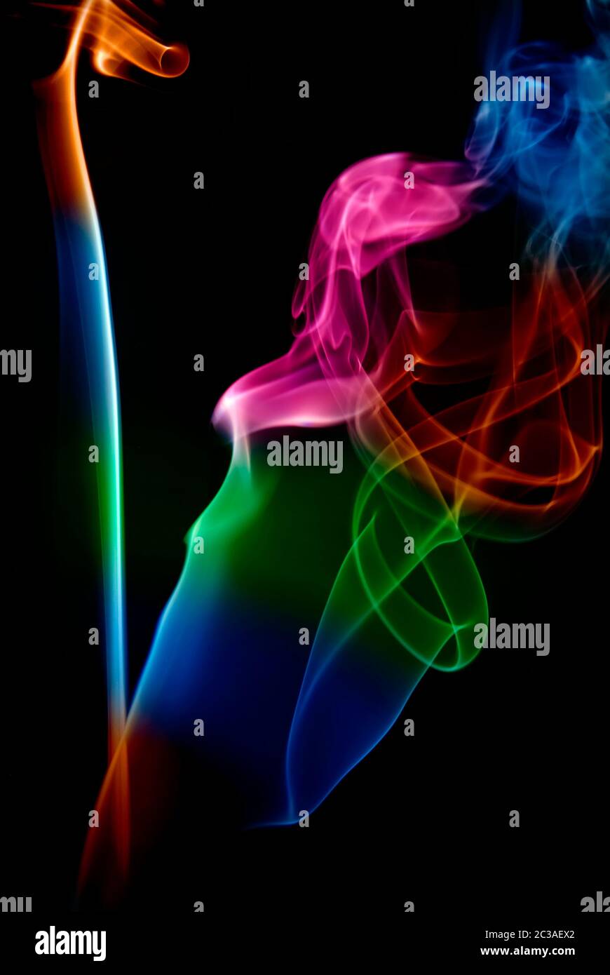 abstract colored smoke in a black background Stock Photo - Alamy