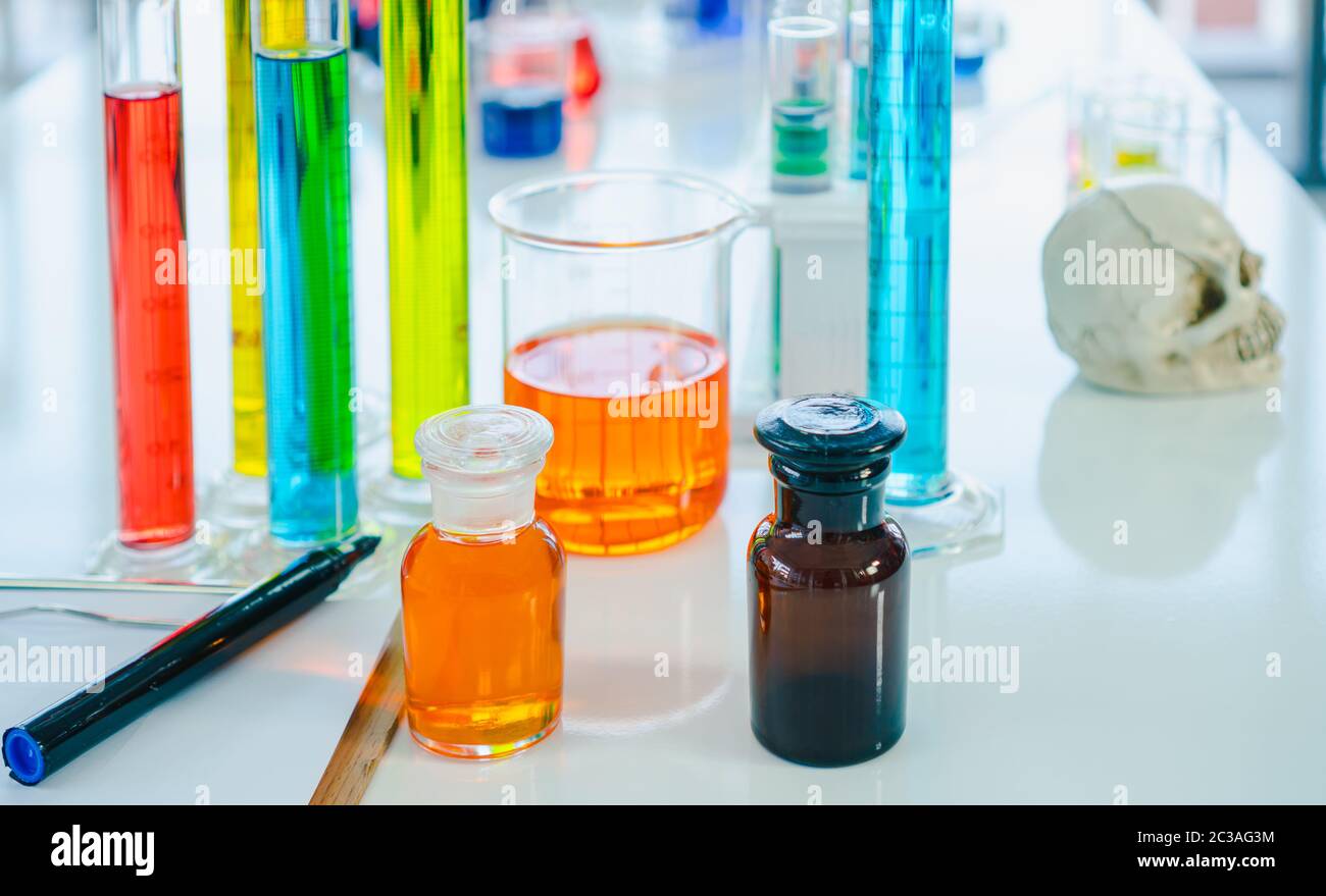 Glass tubes for chemical reagent for science experiments are placed on the table in the