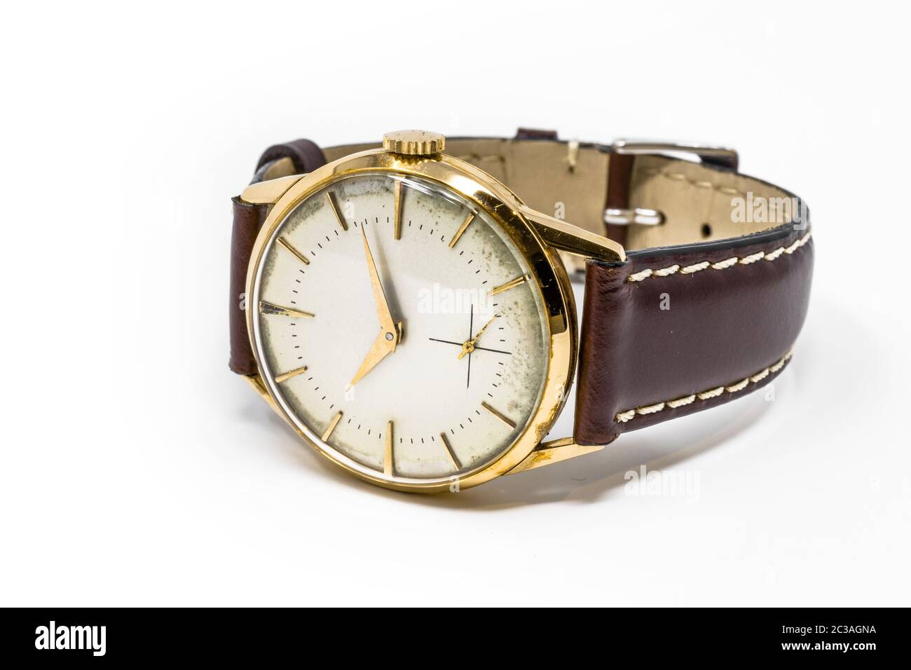 An old gold mechanical wristwatch with manual winding. Antique watch