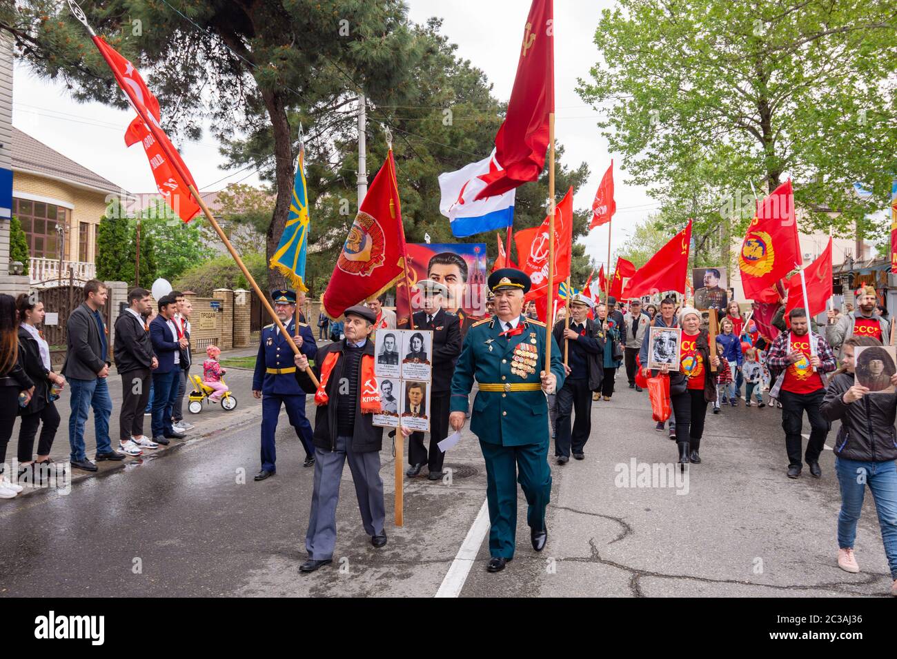 Anapa, Russia - May 9, 2019: Communists walk down the street at the victory parade in Anapa Stock Photo
