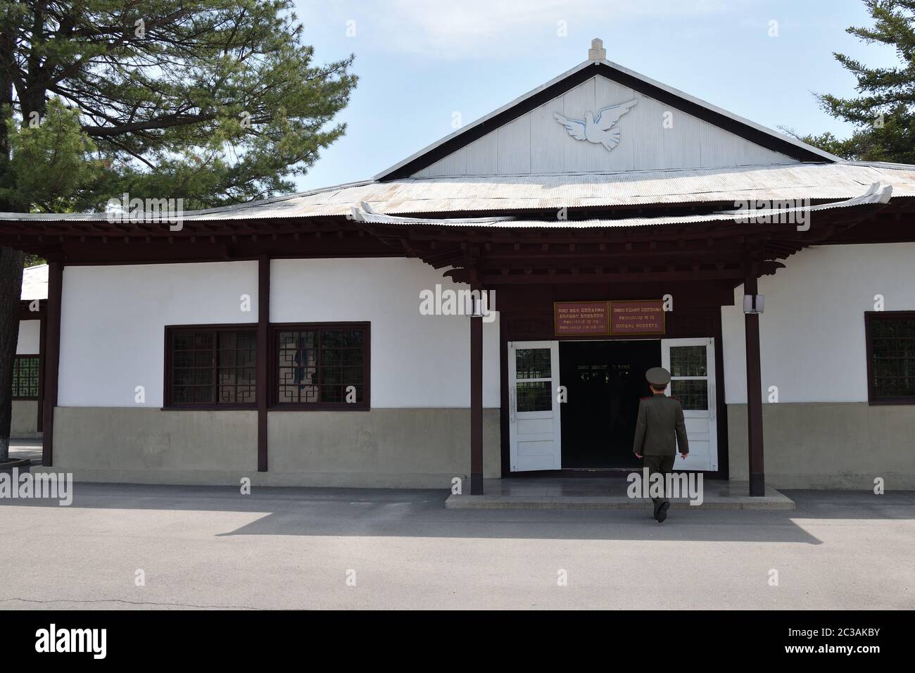 Panmunjom, North Korea - May 5, 2019: Building of North Korea Peace Museum in Joint Security Area. The demilitarized zone. Officer of the North Korean Stock Photo