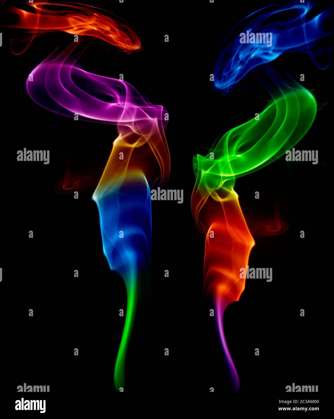 abstract colored smoke in a black background Stock Photo - Alamy