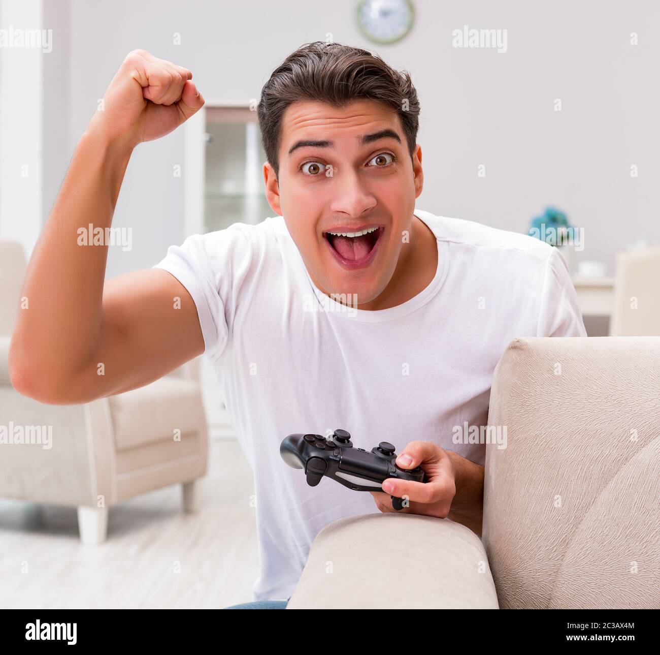Man addicted to computer games Stock Photo - Alamy