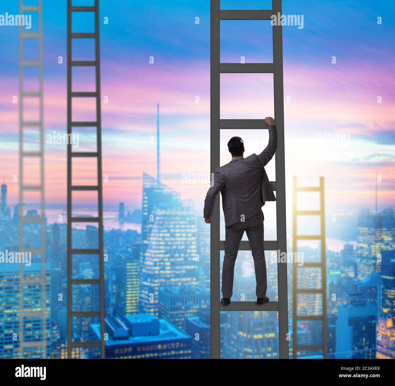 Young businessman climbing career ladder Stock Photo - Alamy