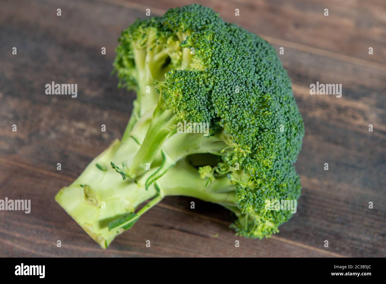 organic broccoli on the wooden background Stock Photo