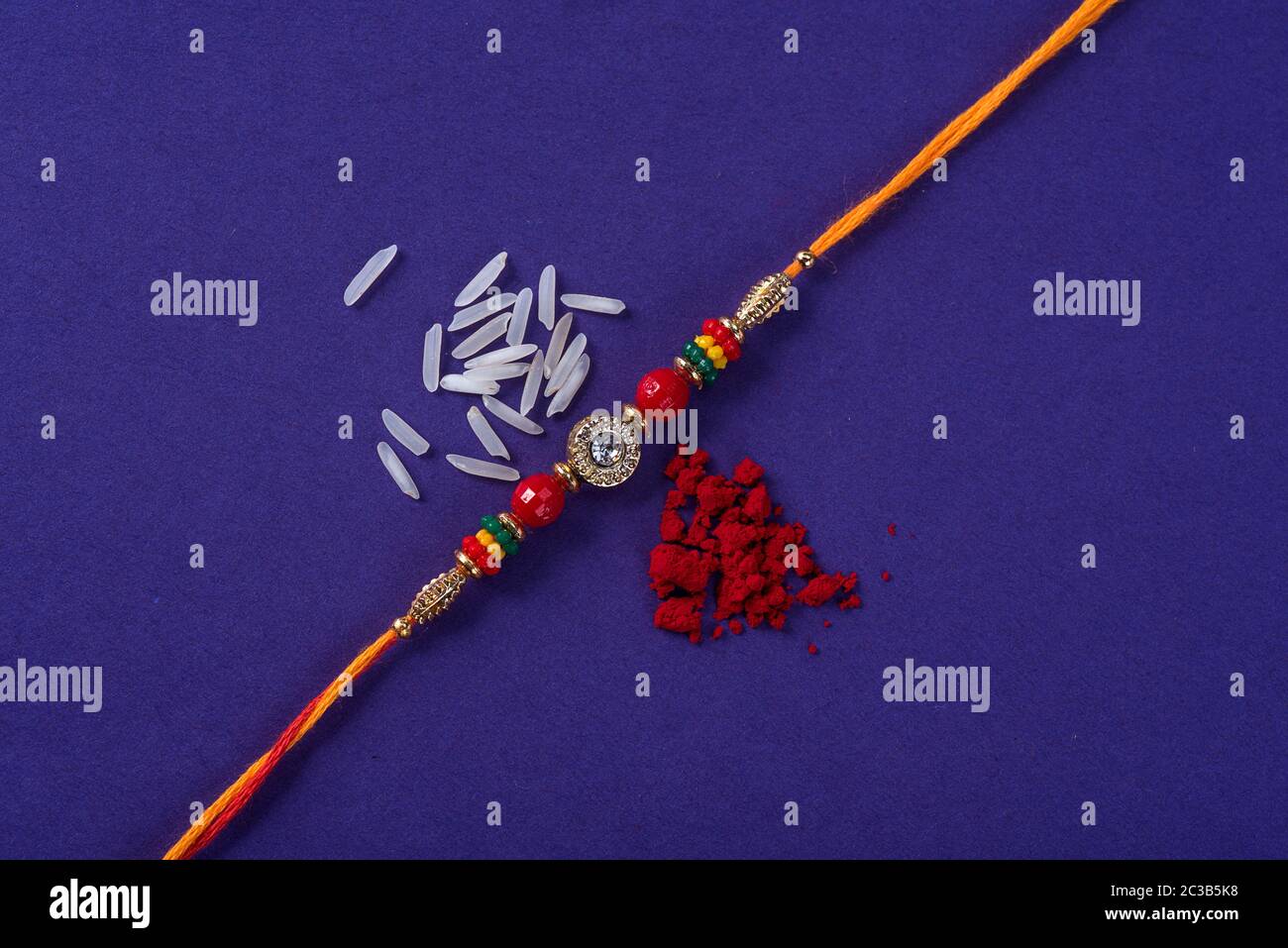 Raksha Bandhan : Rakhi with rice grains and kumkum. An Indian festive ...