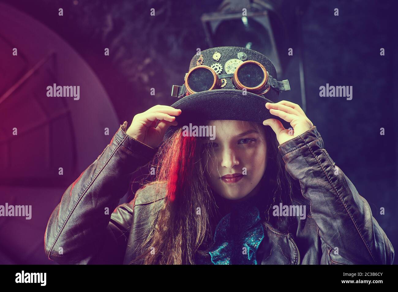 Beautiful steampunk teen girl  over vintage background Stock Photo