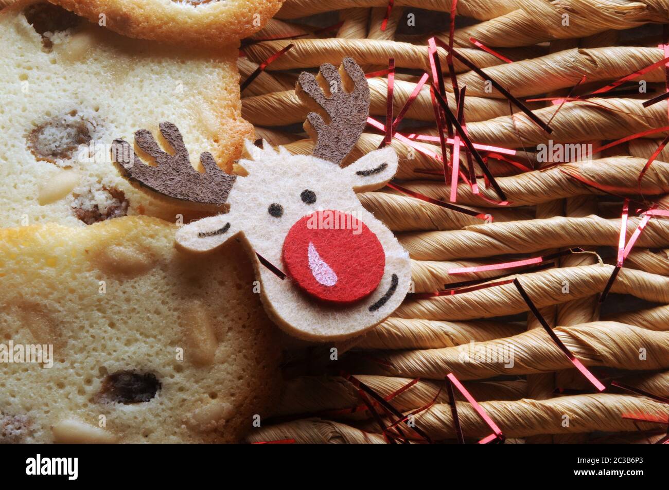 Christmas biscuits with reindeer on straw background Stock Photo