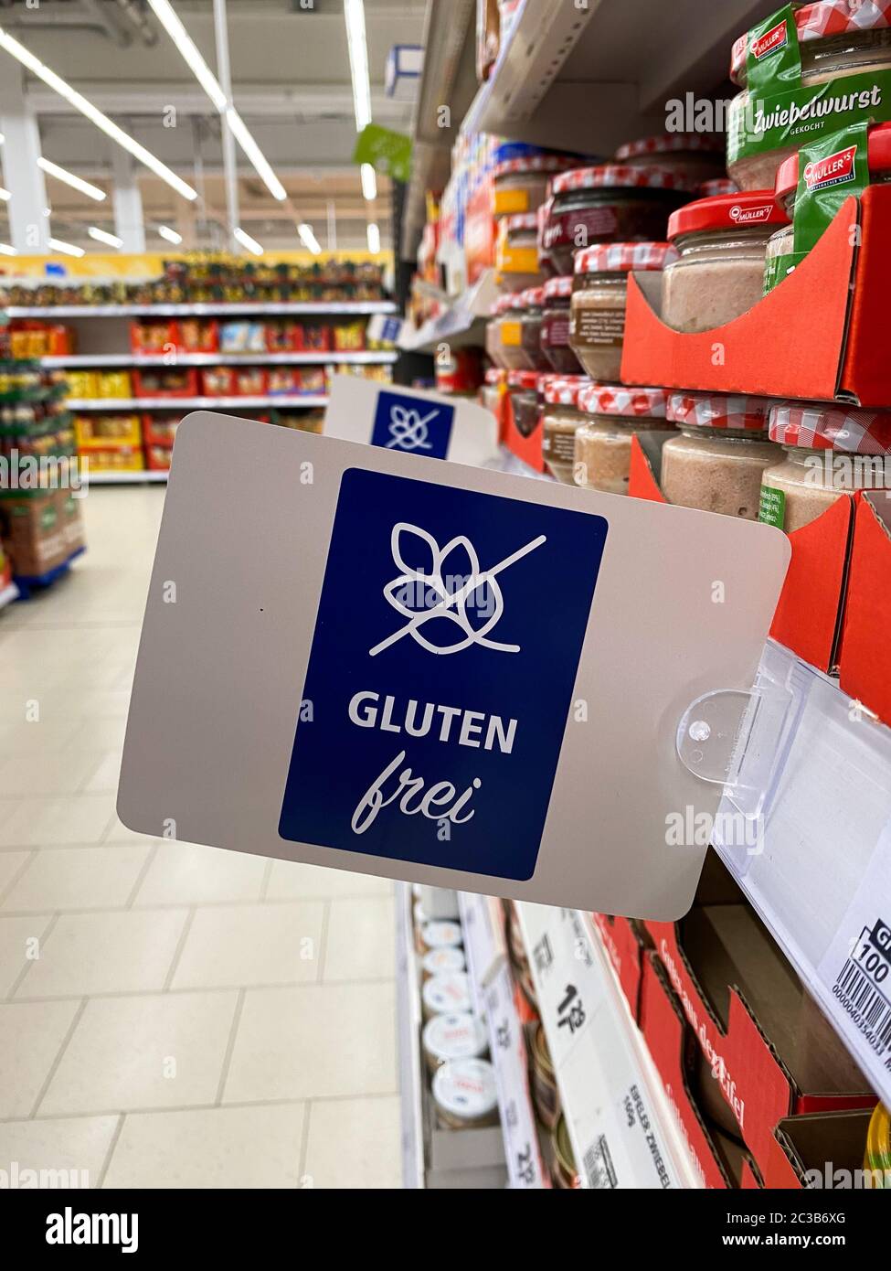 Tönisvorst, Germany - June 18. 2020: View on isolated gluten free (glutenfrei) sign at german supermarket shelf (focus on sign) Stock Photo
