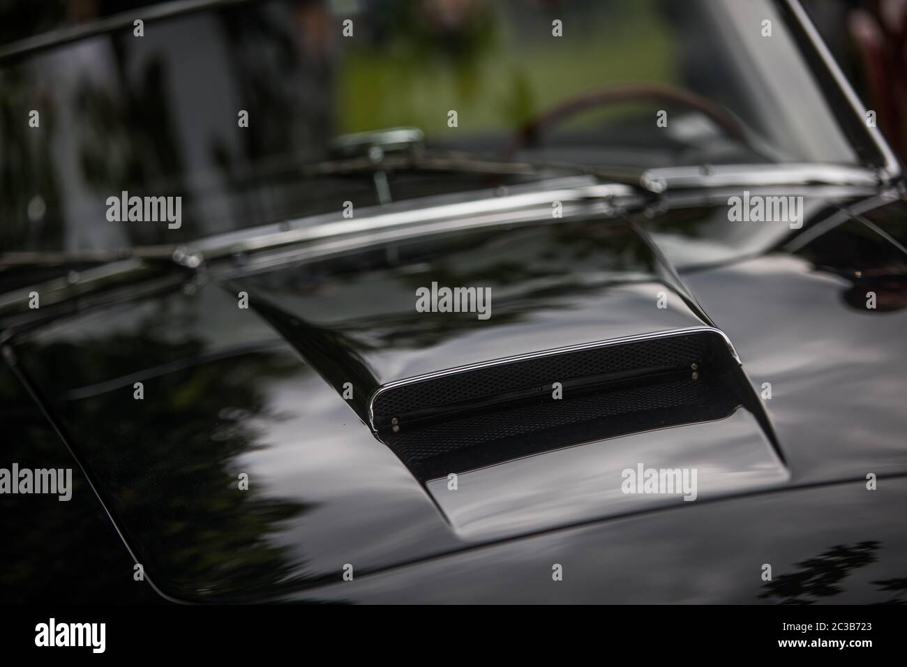 Shiny black metallic car paint hi-res stock photography and images