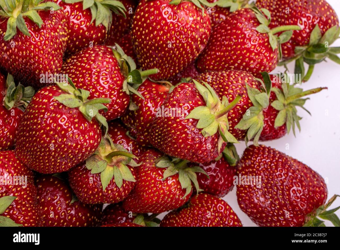 fresh ripe strawberries isolated on white background Stock Photo - Alamy