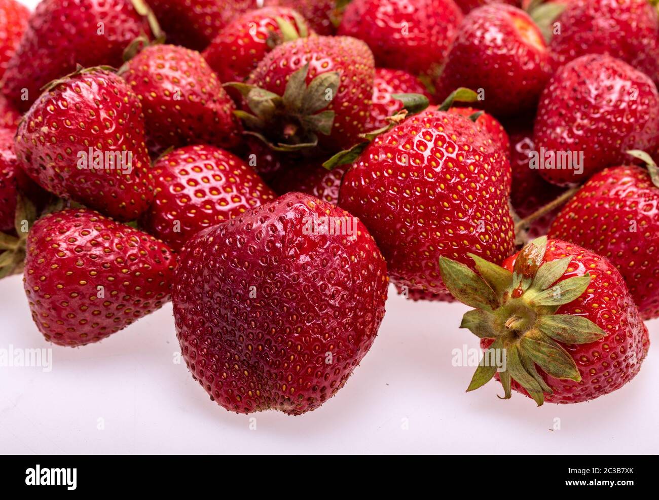 fresh ripe strawberries isolated on white background Stock Photo - Alamy