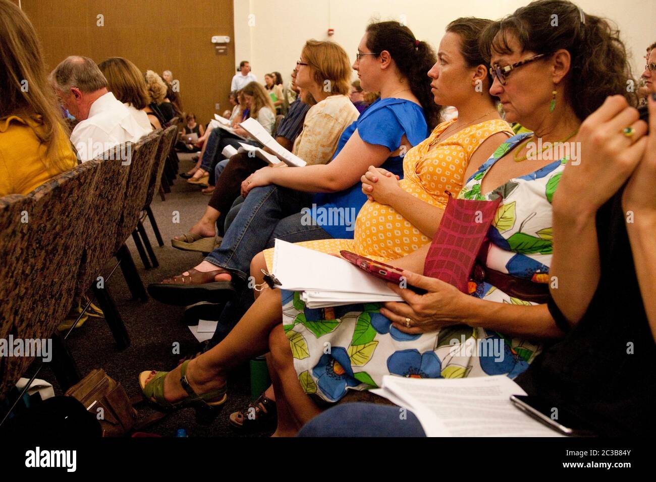 Austin, Texas USA, September 4 2012:  Supporters of women's health care provider Planned Parenthood attend a Texas Department of State Health Services public hearing on a rule to exclude Planned Parenthood from participating in its Woman's Health Program.  ©MKC/ Daemmrich Photos Stock Photo