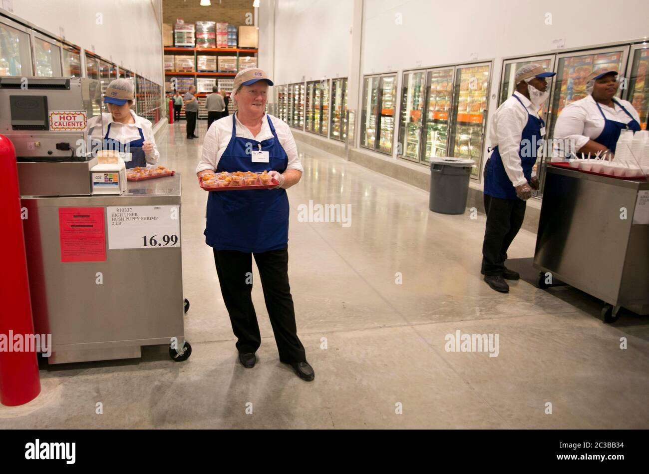 Cedar Park Texas USA, November 22 2013: Employees are ready to offer free food samples at newly opened Costco warehouse club in a fast-growing Austin suburb.   ©Marjorie Kamys Cotera/Daemmrich Photography Stock Photo