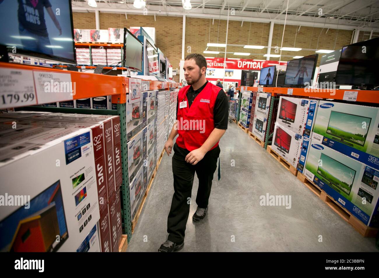 Costco Costco warehouse club employees happily and enthusiastic take