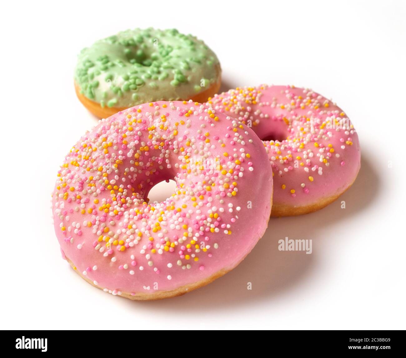 freshly baked donuts isolated on white background Stock Photo - Alamy