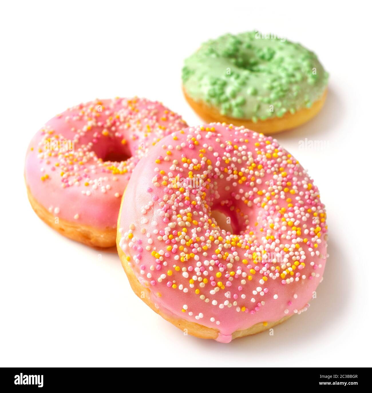 freshly baked donuts isolated on white background Stock Photo - Alamy